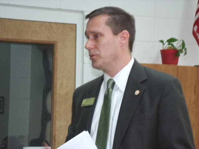 Mark Willis, Assistant Executive Director of Georgia School Board Association congratulates School System 