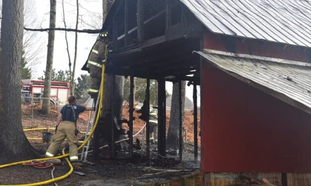Wind Whipped Fire Burns Outbuilding In Cleveland